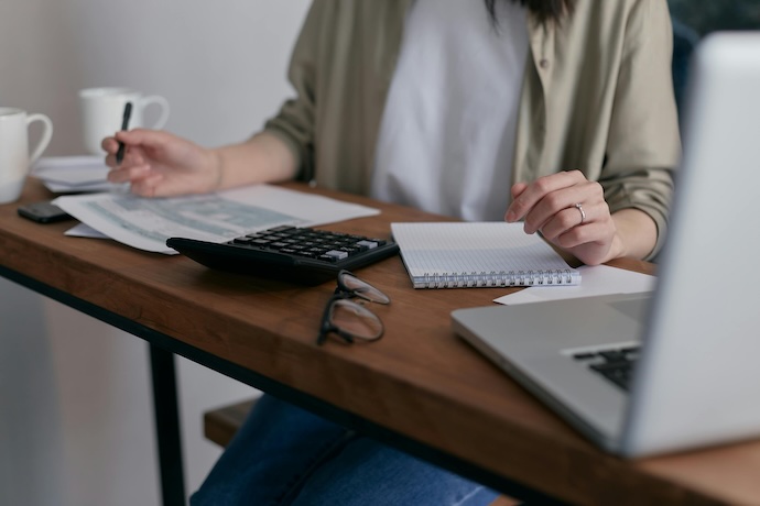 woman at computer doing financials
