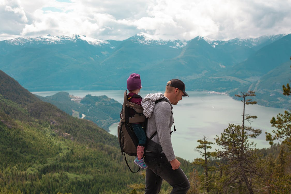a dad and son on holiday in beautiful surroundings