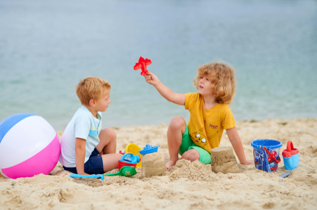 kids play on beach