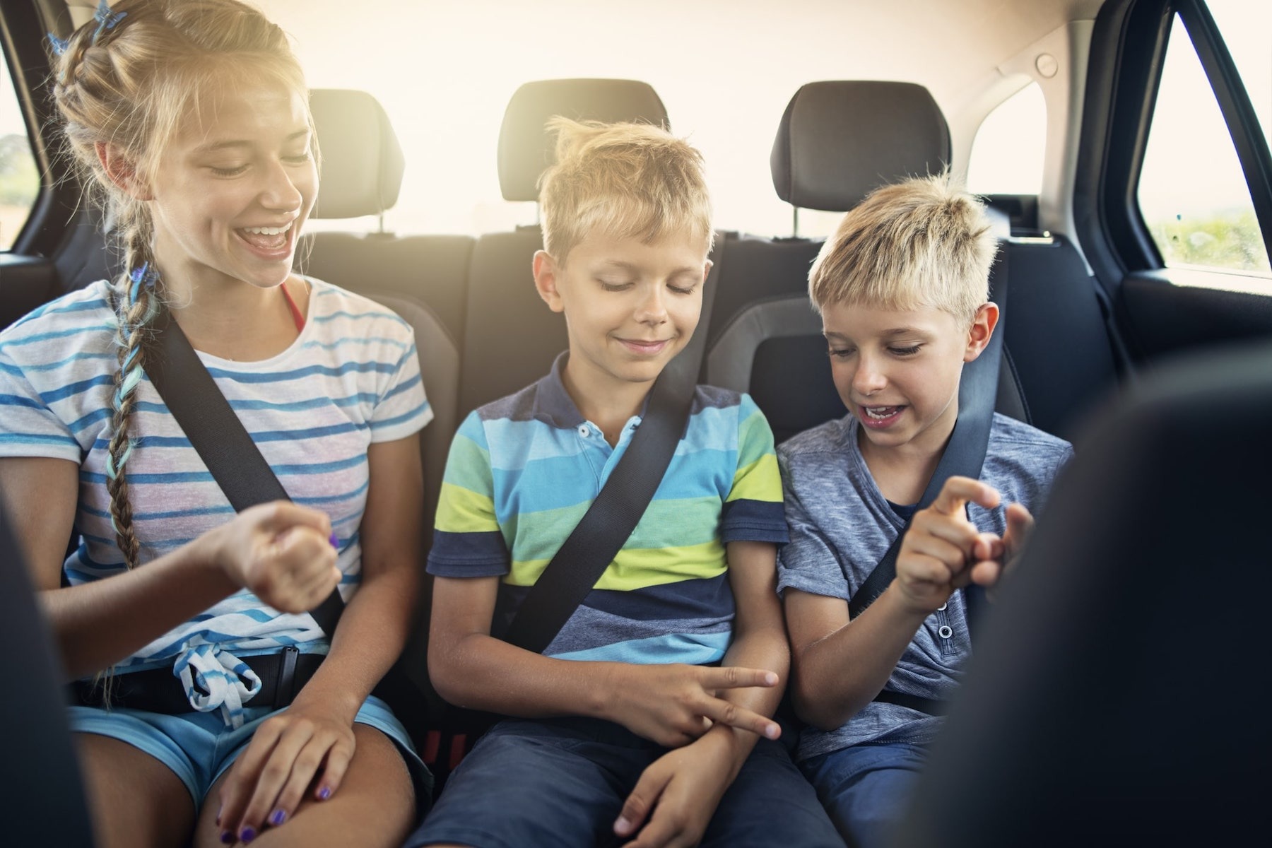 kids in backseat of car