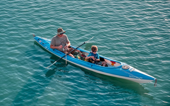 dad and son in canoe