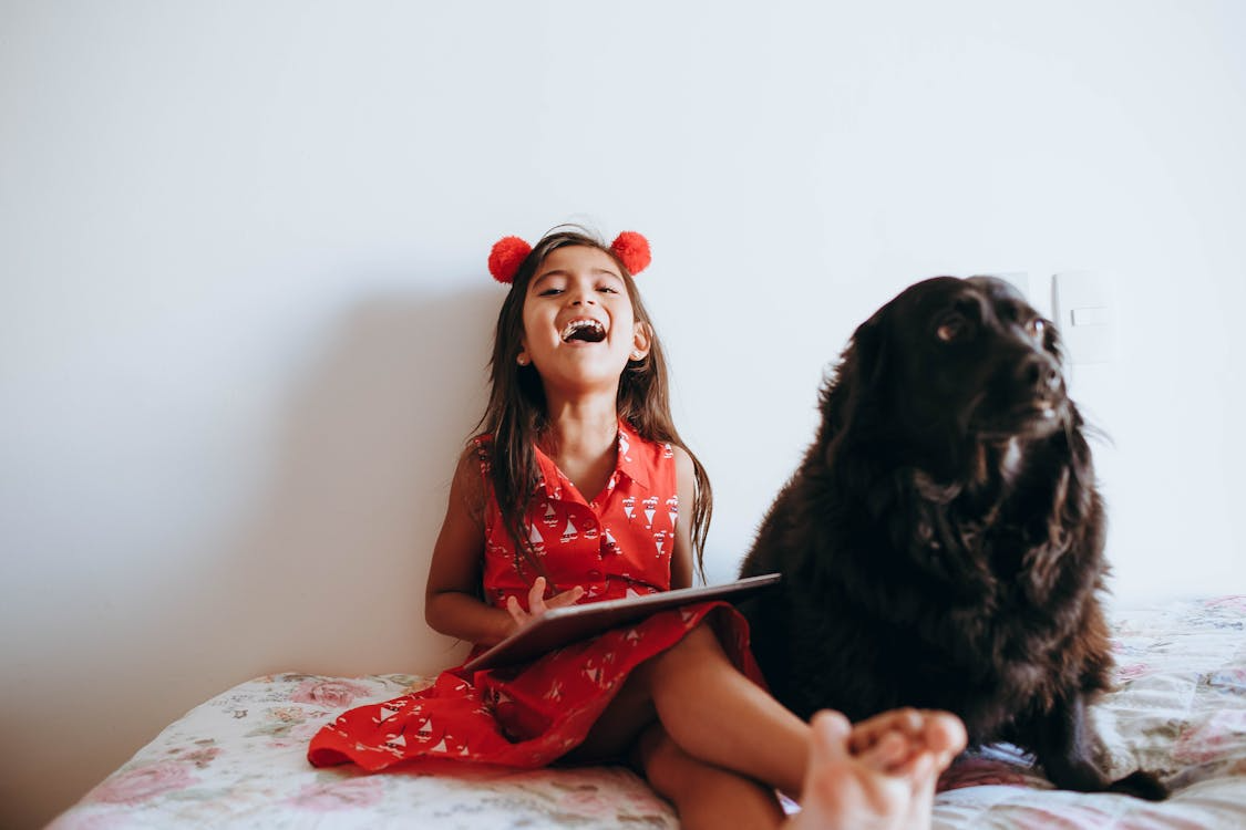young girl with her dog
