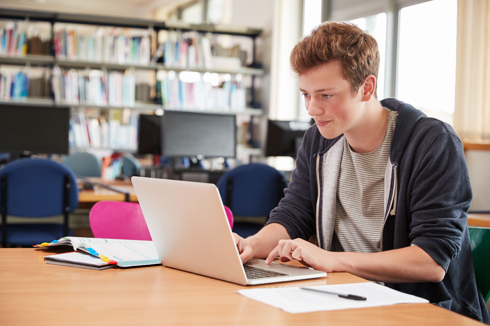 Teen boy at laptop