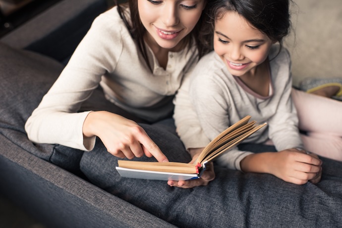 mom and daughter reading