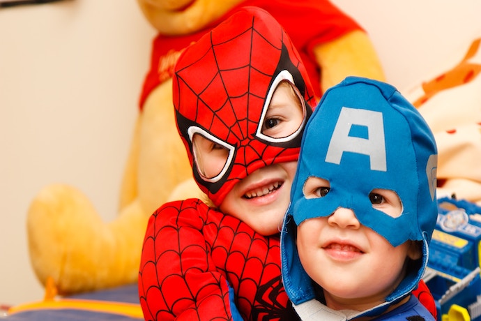 kids dressed for super hero birthday party