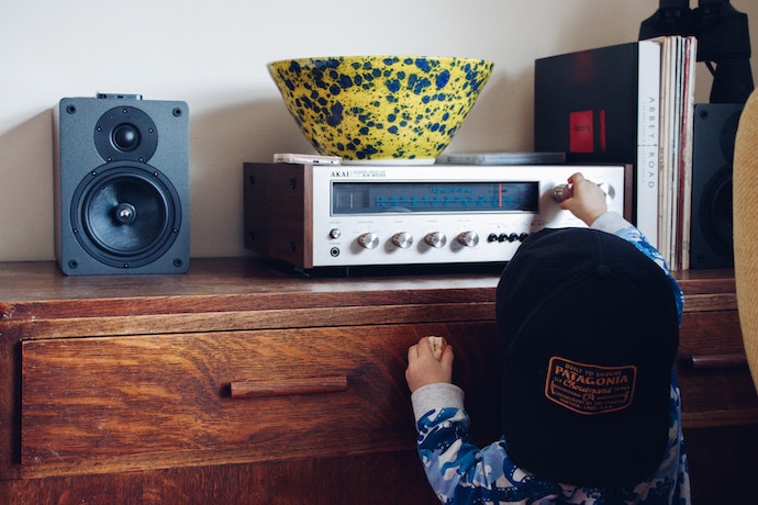 a kid turns up the music
