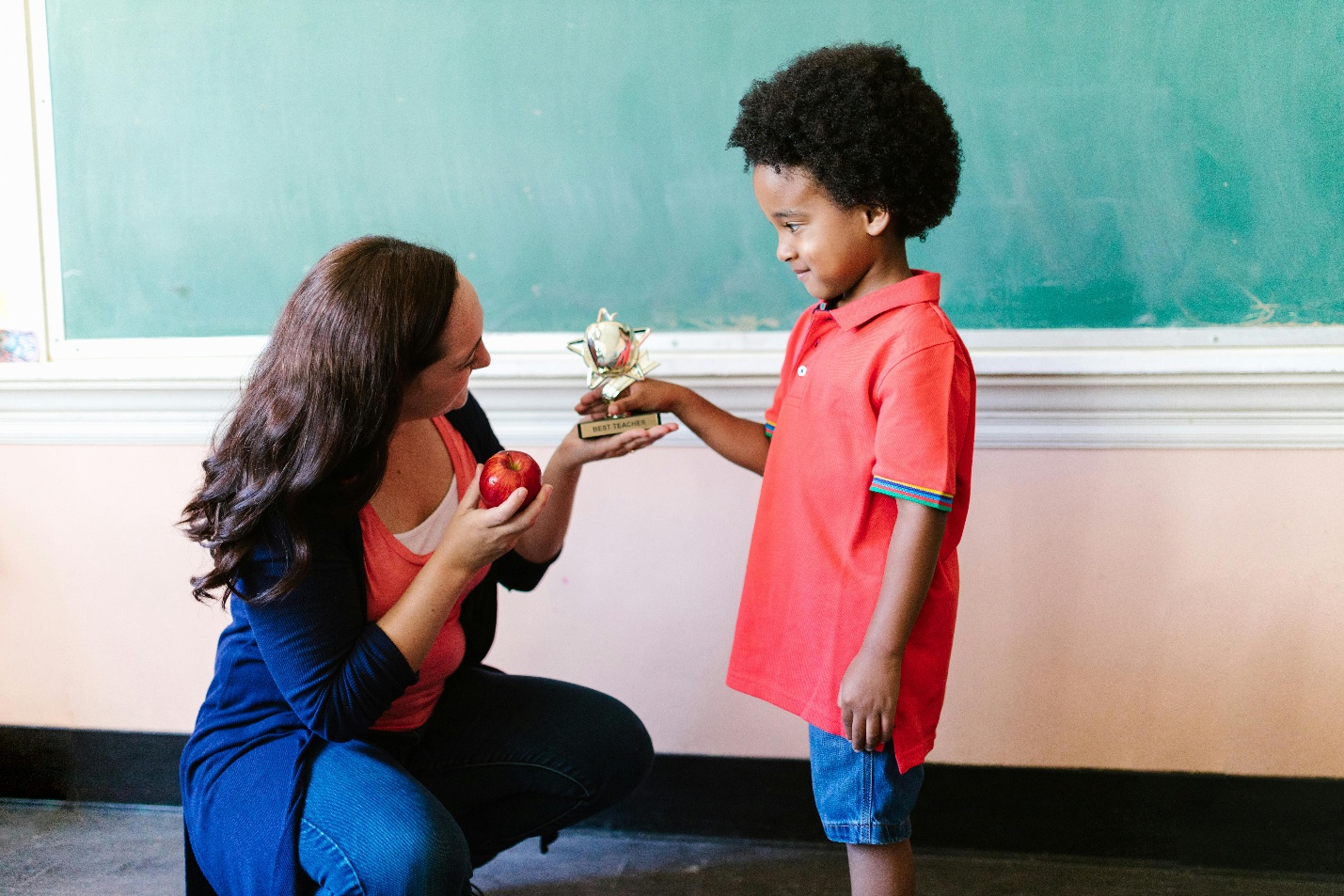 Teacher with small boy