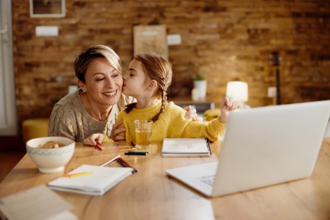mum and daughter at laptop