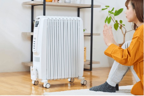 woman with space heater