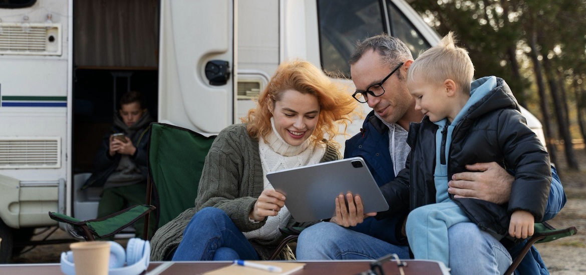 family outside RV