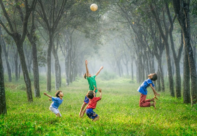 kids play football outside