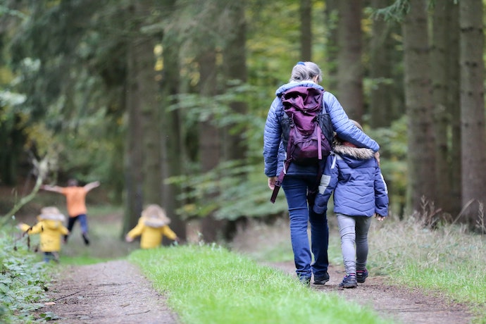 family enjoying a hike in nature