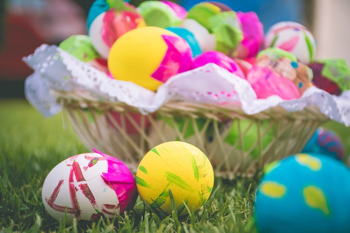 brightly coloured Easter Eggs in a basket