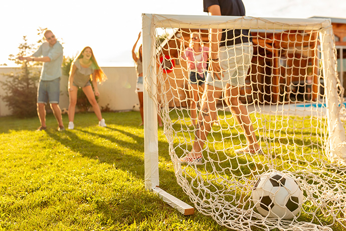 a goal is scored in a net in the garden