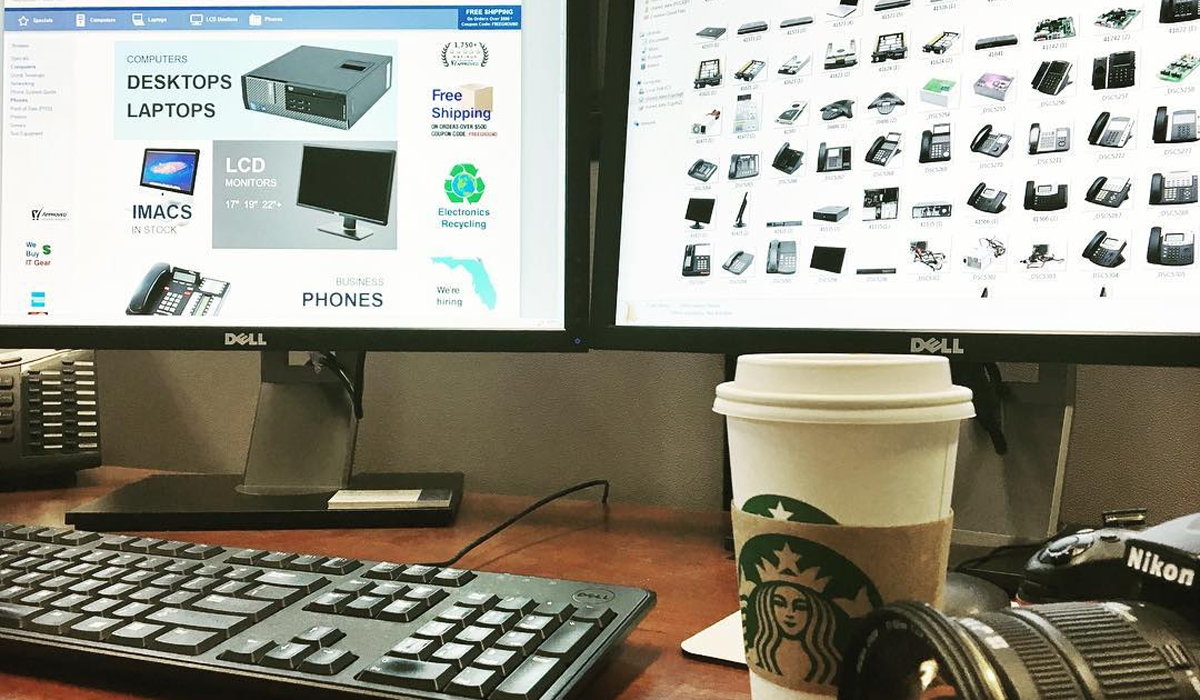 ALT Text: Dual monitor office workspace with coffee