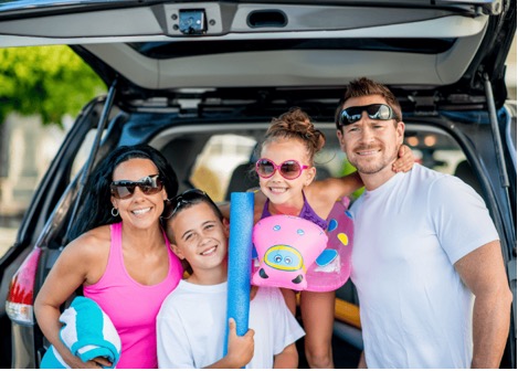 Parents and kids getting ready to swim