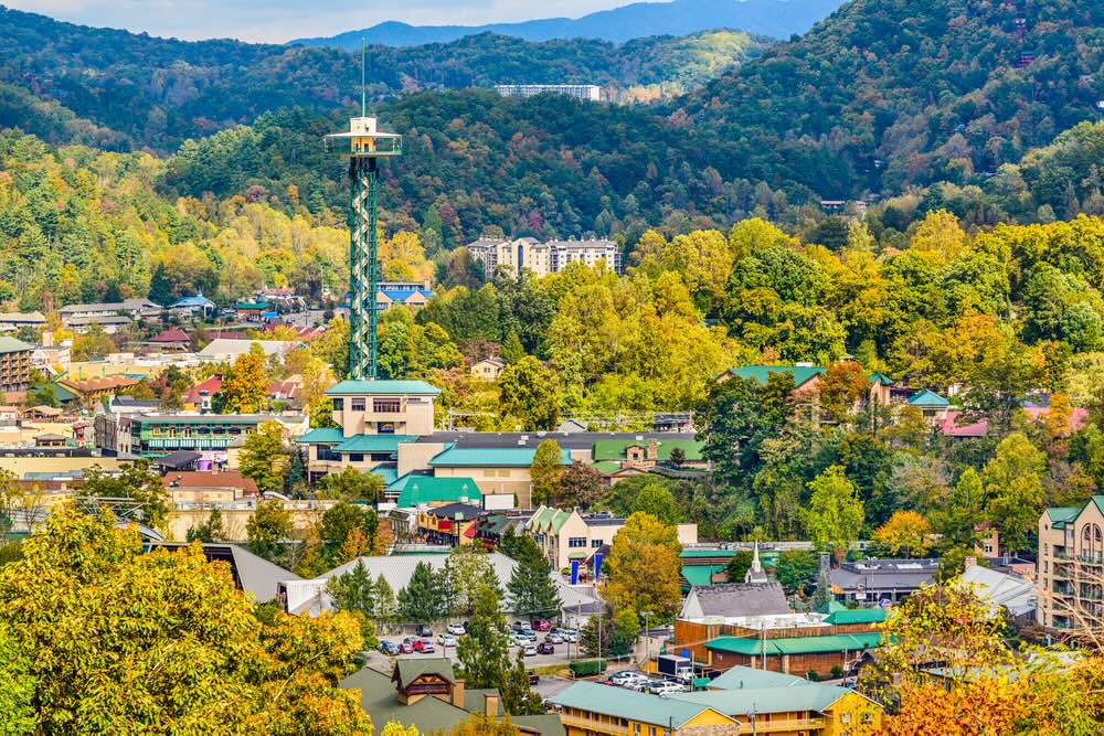 A panoramic view of Gatlinburg, Tennessee amidst the Smoky Mountains