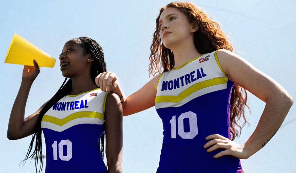 ALT Text: Two confident female Montreal cheerleaders