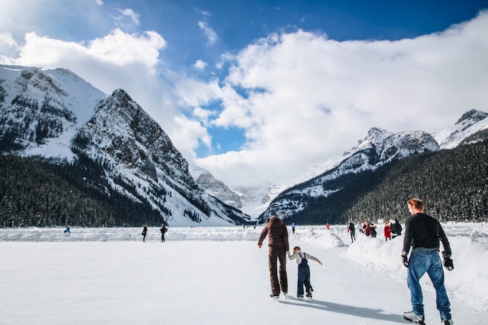 a family trek in a snowy scene