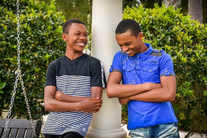 two young friends chat