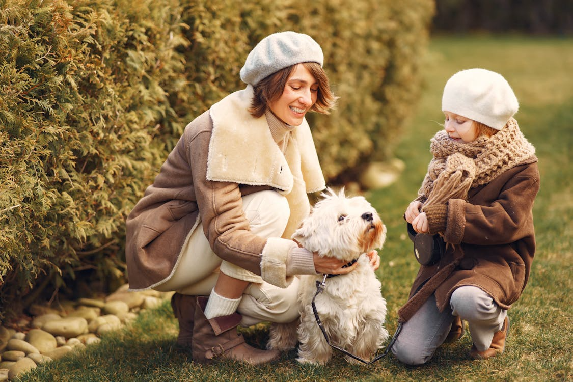 mum with daughter and dog