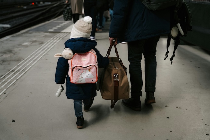 kids with back packed ready to fly