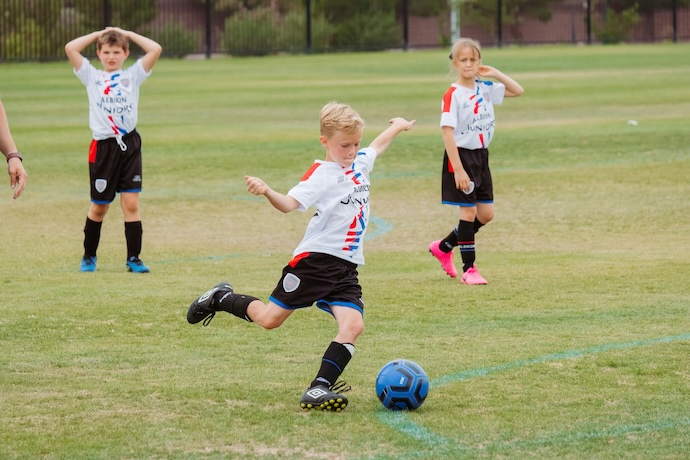 boys playing soccer