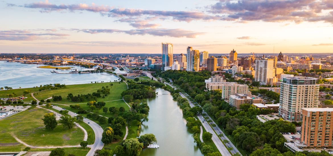 milwaukee city guide skyline sunset over river