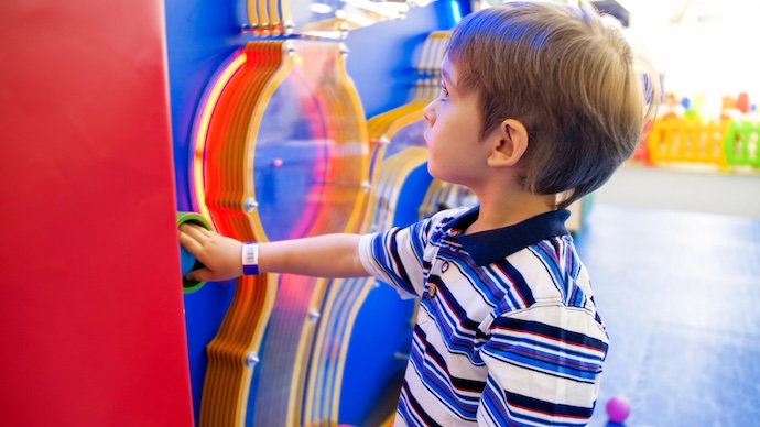 boy having fun at museum