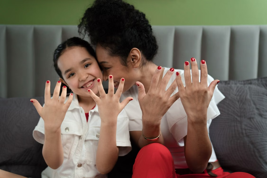 mum and daughter doing nails