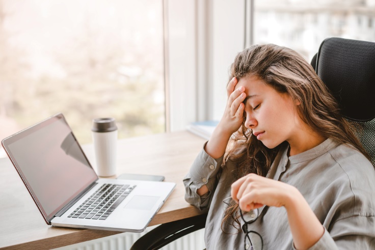 burned out out woman on laptop