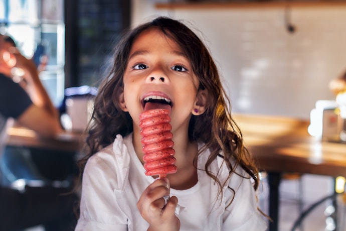 a girl with an ice cream lolly
