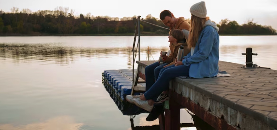 family fishing on pier