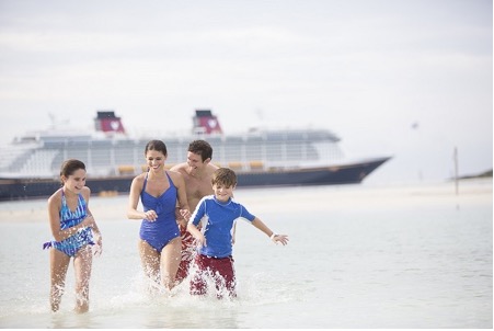 family playing in sea