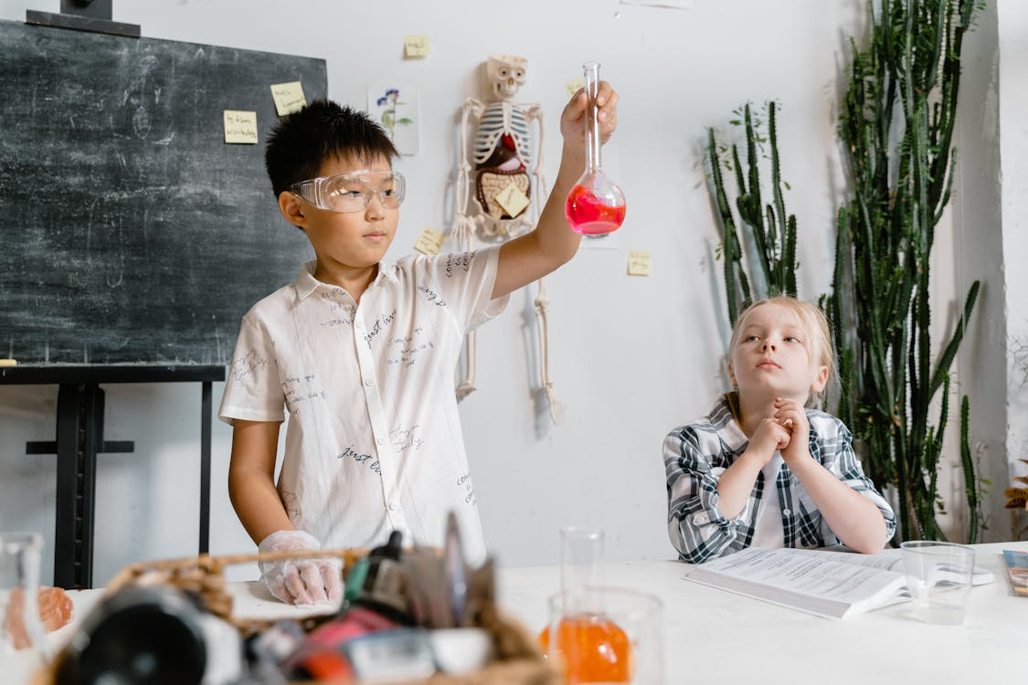 Students doing a science experiment in a classroom lab