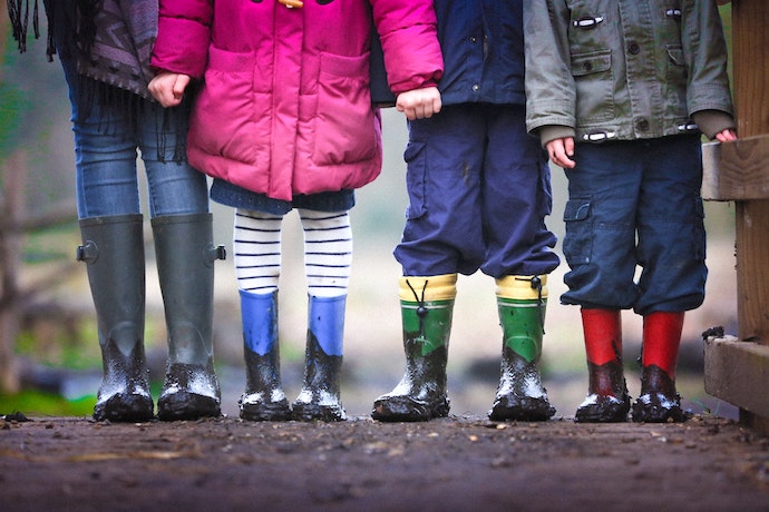 a series of kids in their wellington boots