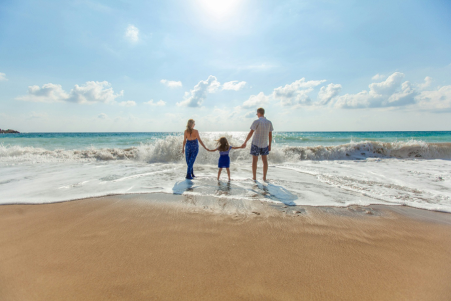 family on beach holiday