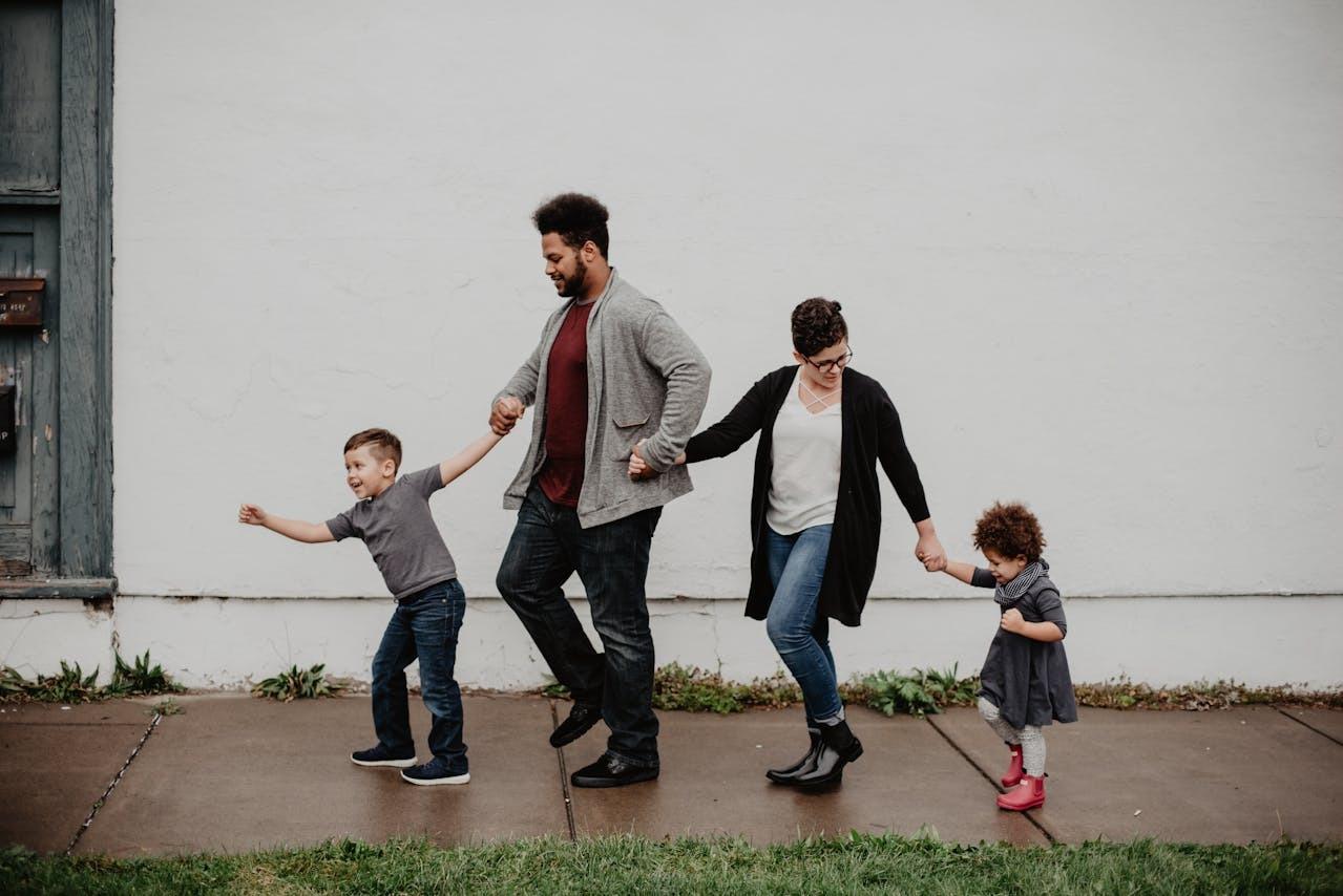 a family walking down the street