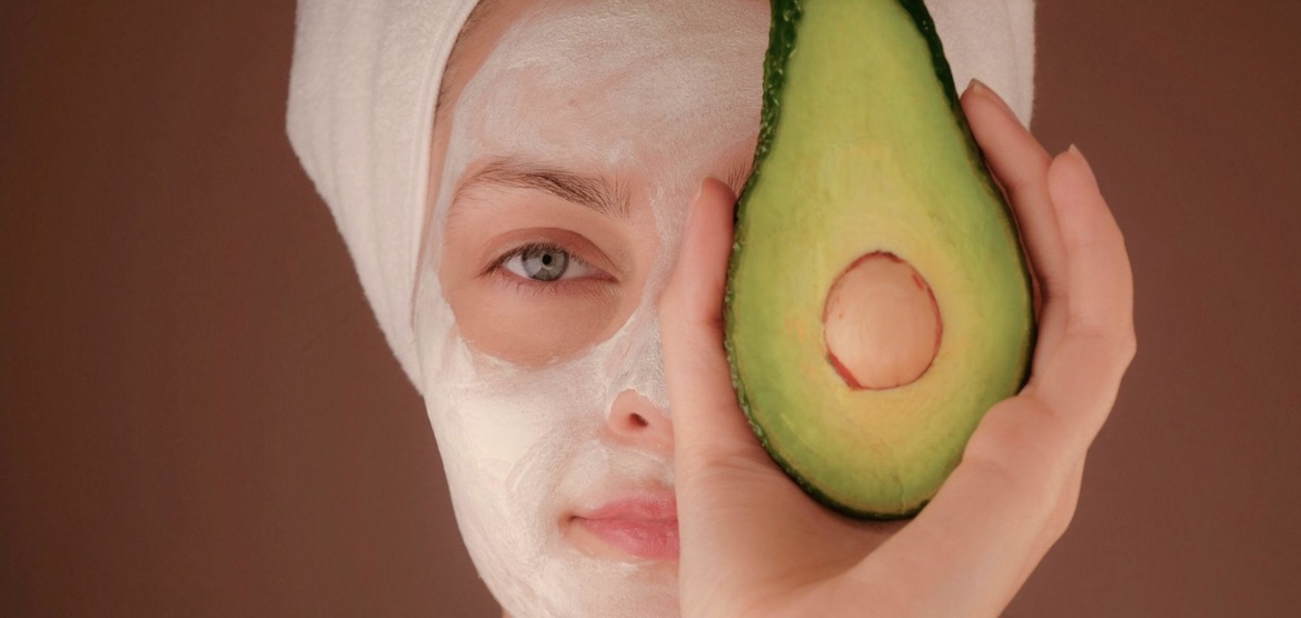 woman applying skincare regime