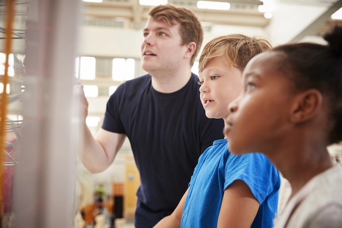 kids engaged at museum exhibit
