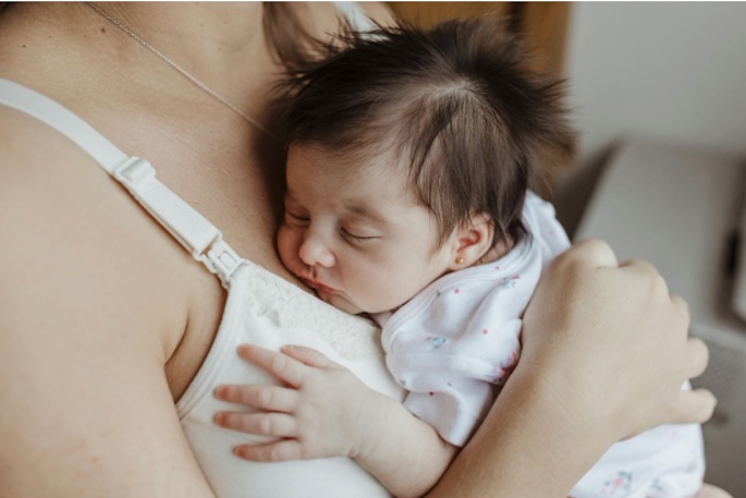 baby on mums chest