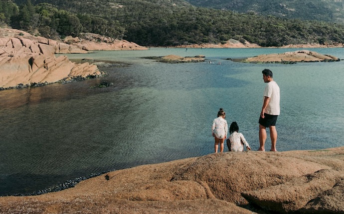 family near lake