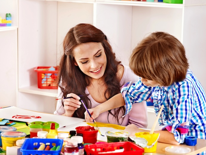 mom and son doing crafts