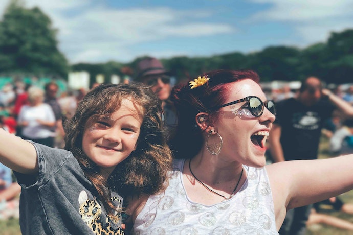a mum and daughter at a family festival