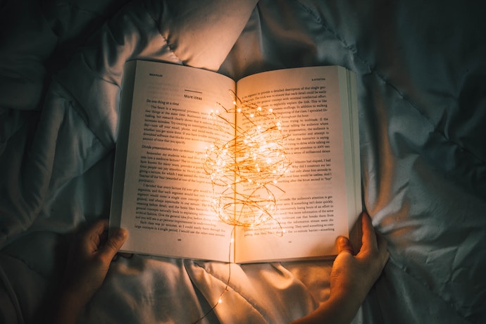 a book lights up with stories