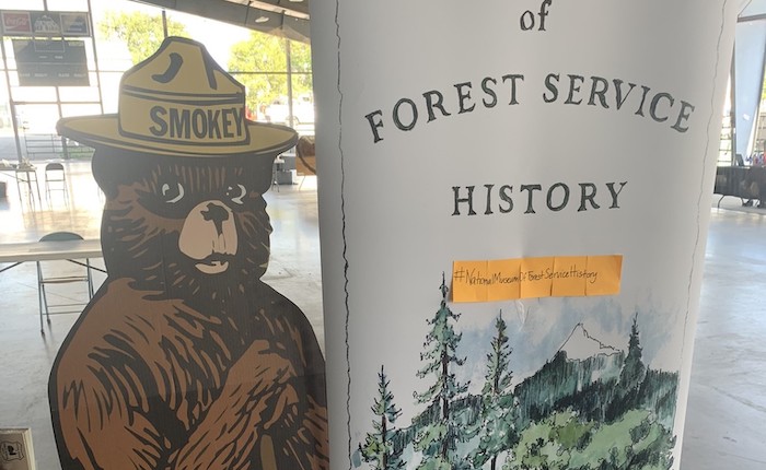 national museum of forest service history cardboard bear next to sign
