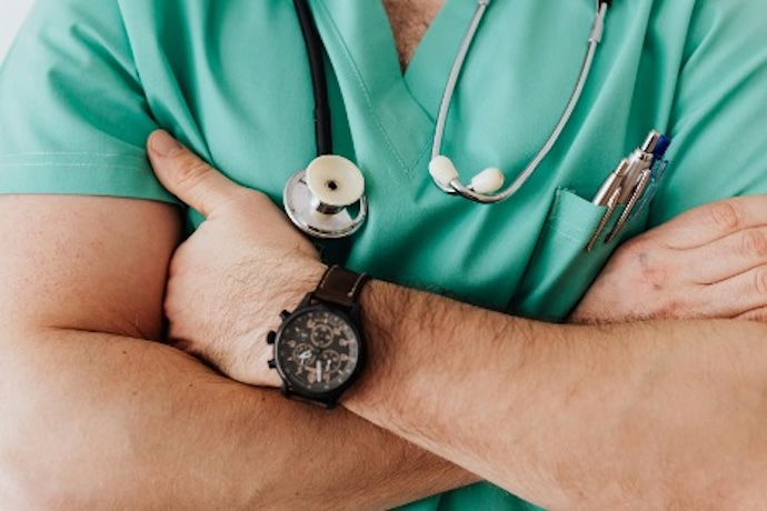male nurse with arms crossed