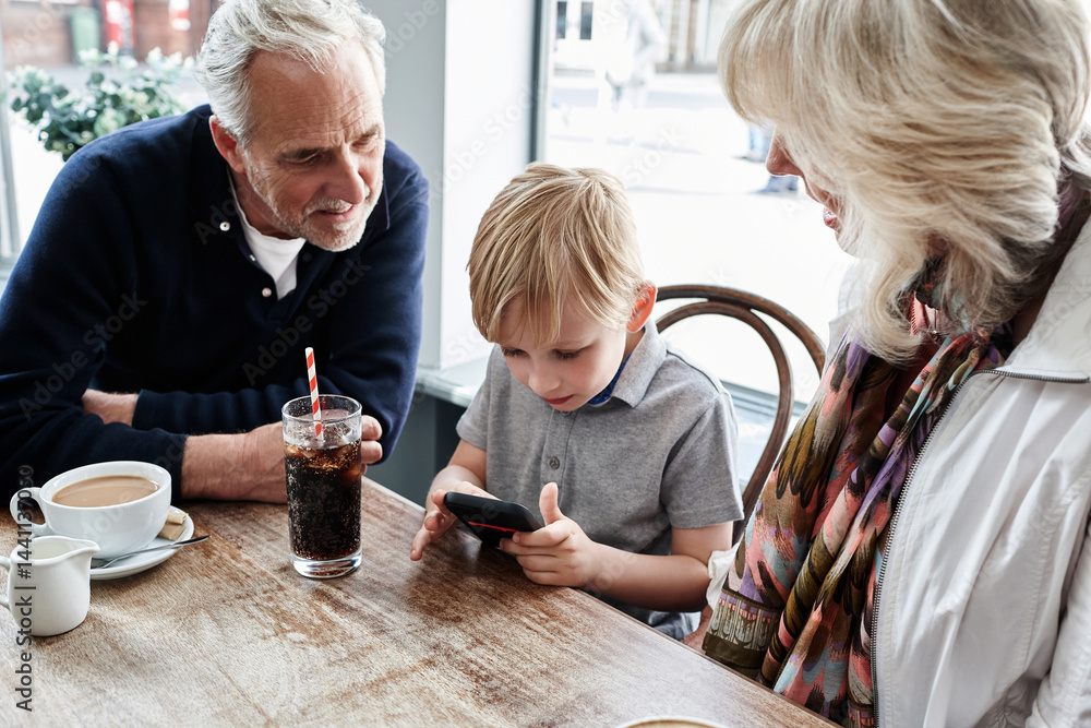 grandparents with boy