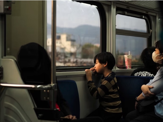 kid on train
