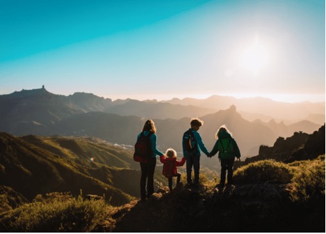 Mother with kids travel in mountains hiking